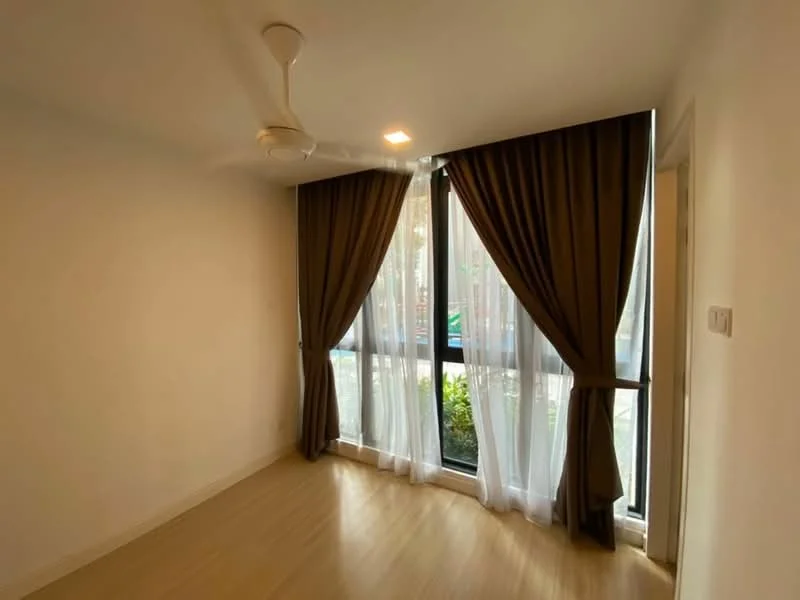 Room features: light wood flooring, white painted walls, floor-to-ceiling windows, sheer curtains, dark brown curtains, 5-blade ceiling fan with light, natural light from windows, view of greenery outside; style: modern; view: garden.