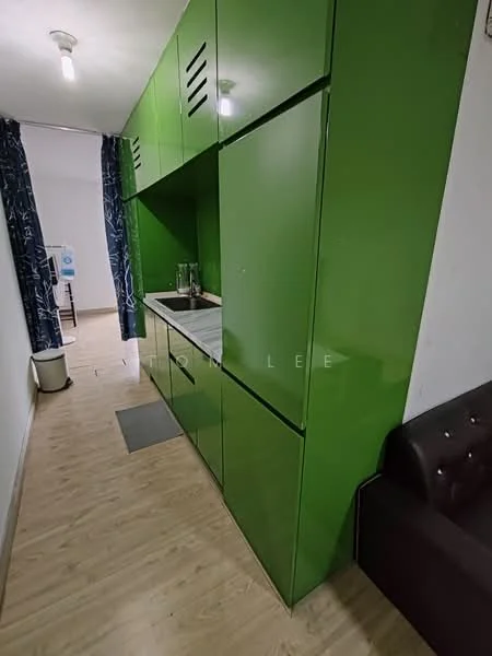 Kitchen features: green cabinetry, single-bowl stainless-steel sink, chrome pull-down faucet, wood laminate flooring, recessed ceiling lights, countertop space, ventilation grilles on cabinets, open layout, wall-mounted shelving; style: modern. Room features: light-colored walls, wood laminate flooring, curtains, sofa.
