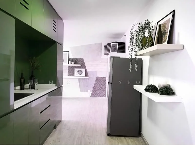 Kitchen features: green glossy cabinetry, white countertop, stainless-steel fridge, single-bowl stainless-steel sink, chrome pull-down faucet, open shelving, decorative plants on shelves, wall art, laminate flooring, neutral wall color; style: modern.