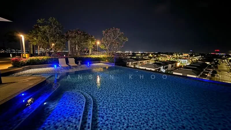 Exterior type: swimming pool deck; features: infinity pool, pool deck with loungers, blue mosaic tile, landscaped garden with trees, night lighting, city skyline view; style: modern.