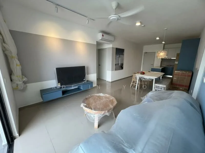 Living features: 3-seater fabric sofa in light blue, coffee table, wall-mounted TV, TV console in light blue, ceiling fan, recessed LED downlights, air conditioning unit, large window with natural light, grey accent wall, light grey tiled flooring; style: modern. Kitchen features: kitchen island, stainless-steel sink, built-in cabinets in blue, pendant lamp, open layout, refrigerator, oven, countertop, bar stools; style: modern.