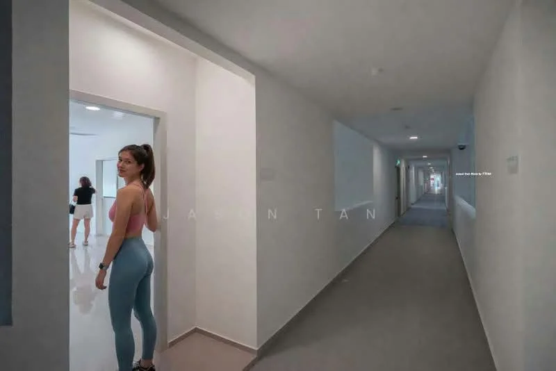 Hallway features: white painted walls, grey carpet flooring, recessed downlights, wide corridor, multiple doorways, smooth ceiling, modern design; style: modern.