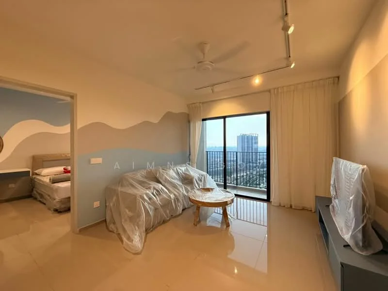 Living features: cream painted walls, light blue accent wall, floor-to-ceiling windows, curtains, ceiling fan, light-colored tiled flooring, sofa covered in plastic, coffee table, TV console covered in plastic, view of city skyline; style: modern; view: city. Room features: bed with mattress covered in plastic, additional bed in background.