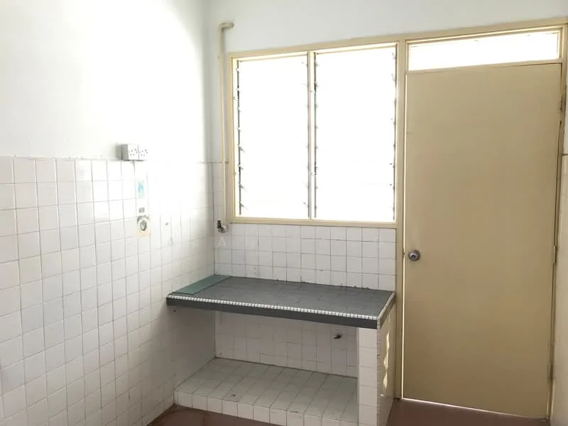 Laundry features: white tiled walls, grey countertop, single sink, window with multiple panes, door with handle, floor with pink tiles.