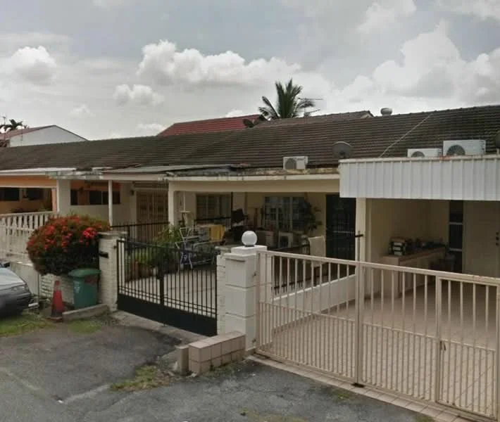 Exterior type: linked terrace house; features: single-storey, white painted facade, gated entrance, manicured garden with flowering plants, driveway with interlocking pavers, visible air conditioning units, flat roof, front porch area, surrounded by residential neighborhood; style: modern.