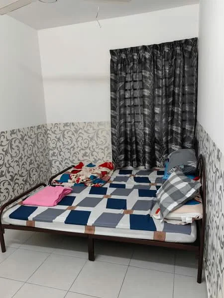 Bedroom features: double bed with patterned bedding, grey and blue quilt, multiple decorative pillows, black and white patterned curtains, white painted walls, decorative wallpaper on lower half of walls, tiled flooring, ceiling fan.