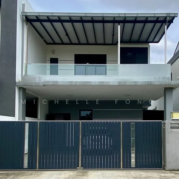 Exterior type: semi-detached house; features: two-storey structure, flat roof with overhang, glass balcony railing, grey painted facade, large windows, main entrance gate, sliding gate, concrete driveway, manicured landscaping, modern architectural design; style: modern.