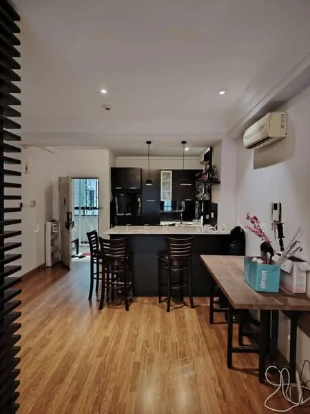 Kitchen features: black cabinetry, white countertop, stainless-steel sink, chrome pull-down faucet, built-in oven, freestanding range oven, refrigerator, bar stools, pendant lighting, wall-mounted split AC, wooden flooring, open layout to dining area; style: modern. Dining features: wooden dining table, wooden dining chairs; style: modern.