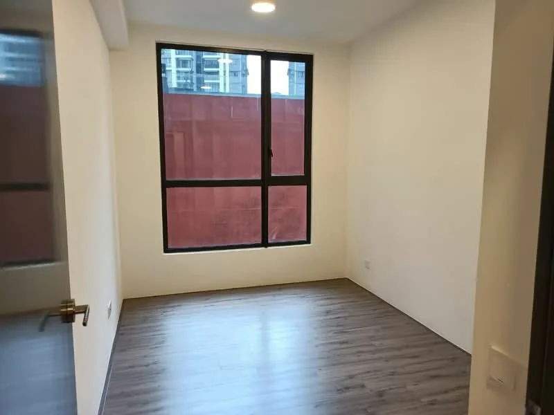 Room features: white painted walls, laminate flooring, large window with black frame, city view, recessed ceiling lights; style: modern; view: city.