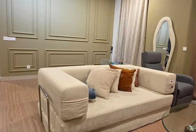 Living features: beige fabric sofa with cushions, wooden flooring, green accent wall with paneling, white curtains, full-length mirror, grey armchair, wall-mounted light switch, decorative pillows; style: modern.