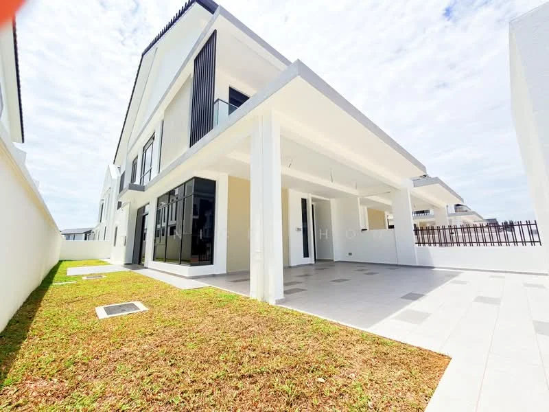 Exterior type: semi-detached house; features: white painted facade, glass windows, flat roof, manicured lawn, stone-paved walkway, covered car porch, two-storey structure, vertical fins on facade; style: modern.