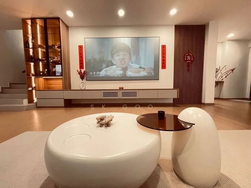 Living features: large wall-mounted TV, white media console with drawers, round coffee table with black top, white sculptural side table, wood panel accent wall, light wood flooring, decorative wall art, floor-to-ceiling windows, recessed ceiling lights; style: modern.