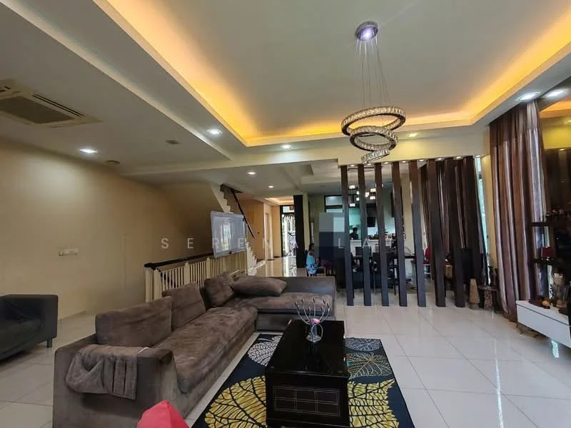 Living features: L-shape sectional sofa in grey, coffee table, area rug with geometric pattern, recessed downlights, chandelier, white painted walls, cream ceiling with crown moulding, floor-to-ceiling windows with sheer curtains, tile flooring, decorative wall with wooden slats, open staircase, wall-mounted TV; style: modern.