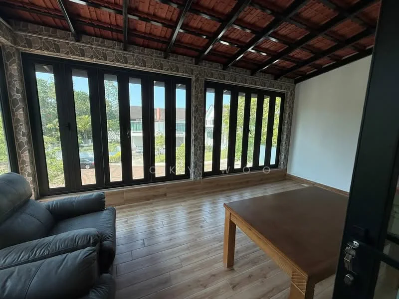 Room features: large floor-to-ceiling windows, black framed windows, wooden flooring, exposed wooden ceiling, stone accent wall, grey stone cladding, dark leather sofa, wooden coffee table, natural light from windows, view of exterior landscape; style: modern; view: garden.