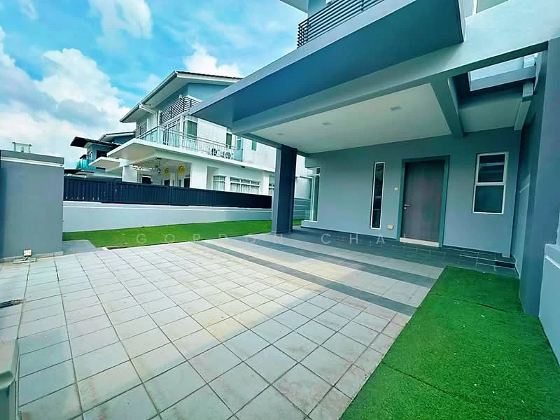 Exterior type: detached bungalow; features: paved patio area, green grass lawn, grey painted facade, single-storey, modern architectural design, large windows, covered entrance, concrete wall, outdoor lighting, surrounded by greenery; style: modern.