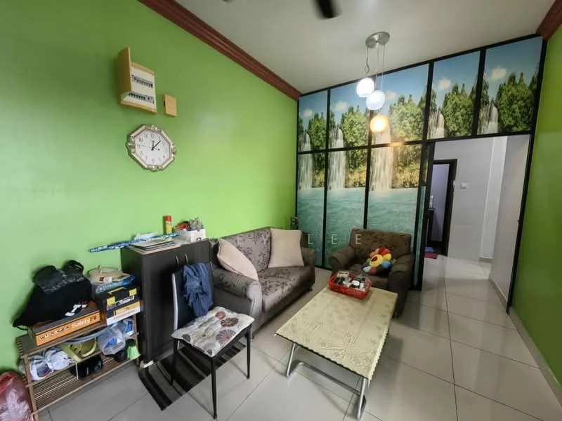 Living features: green painted walls, white ceiling, 3-blade ceiling fan, sofa with floral pattern, coffee table, wall clock, decorative wall mural with waterfall, shelves with books and items, tile flooring; style: modern.