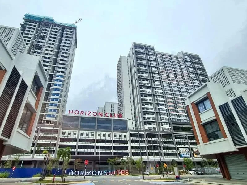 Exterior type: high-rise condominium; features: glass curtain wall, white painted facade, red signage, multiple storeys, balconies on upper floors, manicured landscaping, surrounded by urban environment, modern architectural design; style: modern.