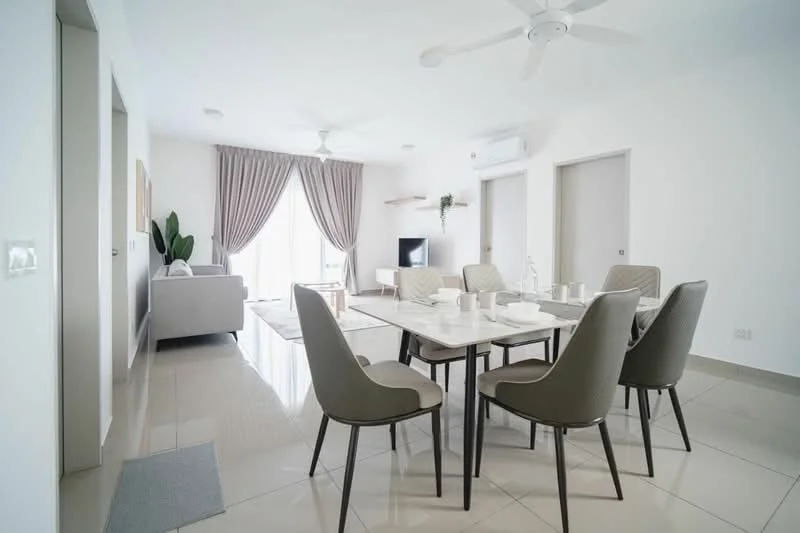 Dining features: 6-seater dining table, grey upholstered dining chairs, white ceramic dinnerware, glass tabletop, recessed downlights, floor-to-ceiling windows, curtains, light-coloured walls, tile flooring, ceiling fan; style: modern; view: garden. Living features: sofa in light grey, wall-mounted TV, shelf, decorative plant, area rug, light-coloured walls, tile flooring, ceiling fan; style: modern.