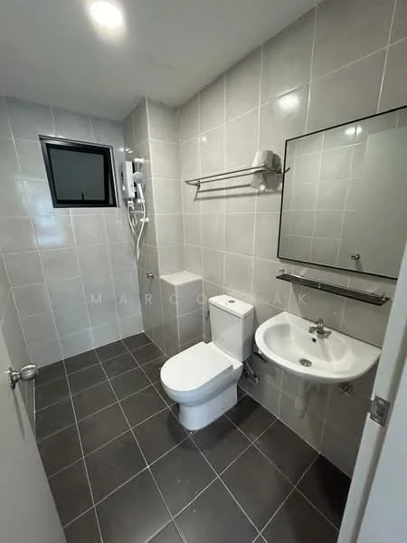 Bathroom features: grey tiled walls, black tiled flooring, one-piece toilet, wall-mounted basin, framed mirror, shower with handheld showerhead, towel rack, window for natural light; style: modern.