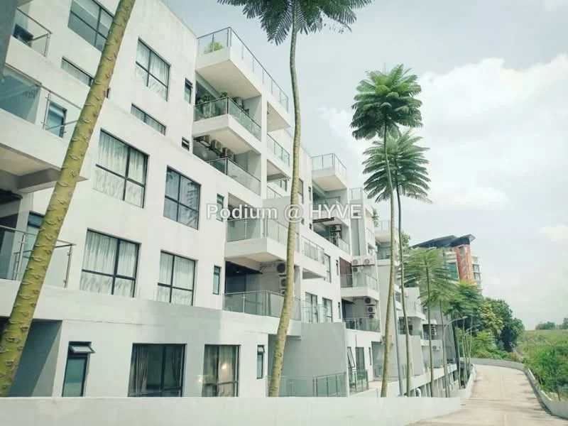 Exterior type: low-rise apartment block; features: white painted facade, balconies with glass railings, large windows, palm trees in front, concrete pathway, surrounded by greenery; style: modern.