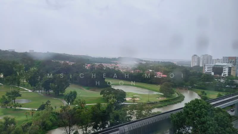 Exterior features: lush green landscape, golf course visible, river running through, residential buildings in distance, overcast sky, trees lining the area.