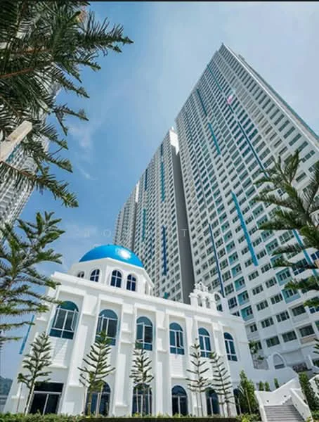 Exterior type: high-rise condominium; features: glass curtain wall, white painted facade, blue dome, manicured landscaping, tall palm trees, multiple balconies, modern architectural design; style: modern.