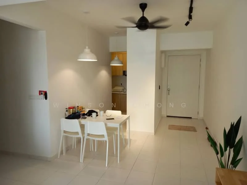 Dining features: white dining table, 4 white dining chairs, pendant light fixture, 5-blade ceiling fan, light-colored tiled flooring, neutral painted walls, plant in ceramic pot, open kitchen area visible in background, doorway leading to entrance, wall-mounted light switch; style: modern. Room features: neutral painted walls, light-colored tiled flooring, doorway leading to entrance.