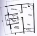 Floor plan: 2-bedroom 1-bathroom unit; features: open-plan kitchen-living, utility room, separate dining area, master bedroom with access to bathroom, second bedroom with window, central foyer, balcony off living room.