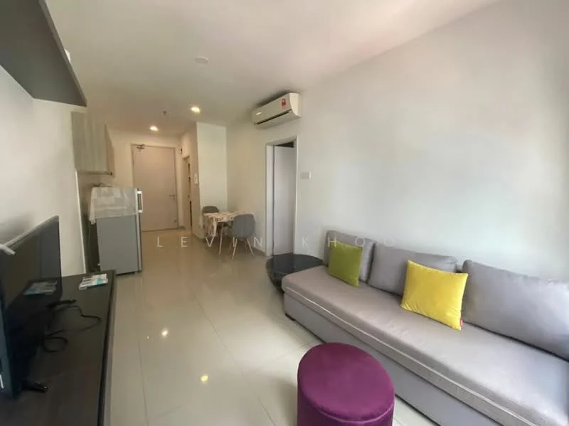 Living features: grey fabric sofa, yellow and purple accent cushions, purple ottoman, wall-mounted TV, TV console, white painted walls, glossy tile flooring, air conditioning unit, dining table with chairs visible in background, refrigerator, doorway leading to hallway, light fixture; style: modern.