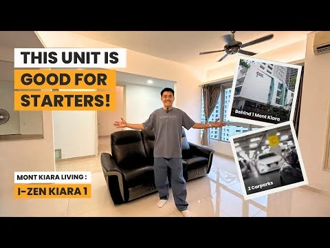 Living features: 3-seater black leather sofa, ceiling fan, wall-mounted air conditioning unit, light-colored walls, laminate flooring, large window with city view, decorative wall art, area rug, coffee table; style: modern; view: city.