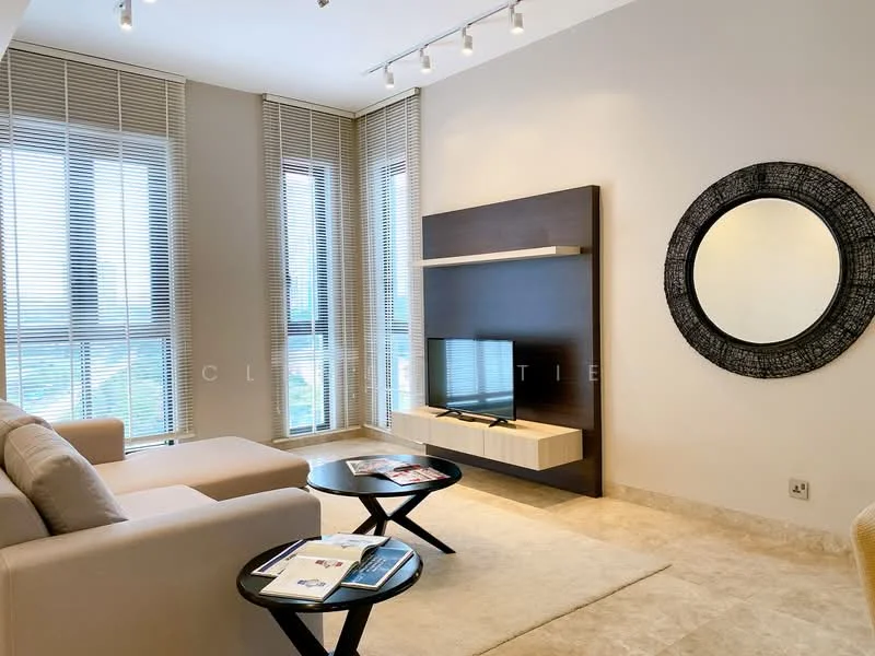 Living features: beige fabric sofa, black coffee table, wall-mounted TV, light-colored media console, decorative round mirror, floor-to-ceiling windows, sheer window blinds, recessed downlights, cream carpet flooring, neutral painted walls; style: modern; view: city.