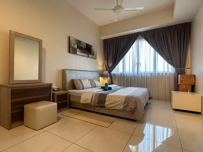 Bedroom features: king-size bed with upholstered headboard, bedding in neutral tones, 2 bedside tables, table lamp on bedside table, full-length mirror, dressing table with drawer, sliding mirror wardrobe, floor-to-ceiling windows, sheer curtains, light brown accent wall, cream painted walls, white ceiling, 5-blade ceiling fan, polished tile flooring, area rug; style: modern; view: city.