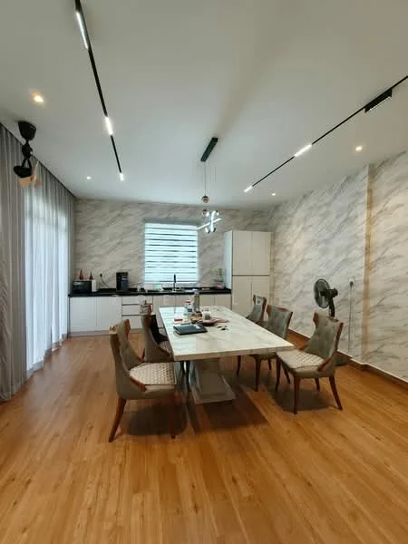 Dining features: wooden flooring, marble-patterned feature wall, white cabinetry, black countertop, 8-seater dining table, upholstered dining chairs, pendant light fixture, floor-to-ceiling windows with sheer curtains, kitchen appliances visible, ceiling-mounted track lighting; style: modern.