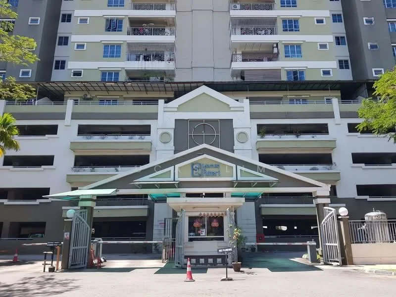 Exterior type: mid-rise condominium; features: grey painted facade, white decorative elements, covered entrance with awning, multiple levels of parking, balconies visible on upper floors, landscaped entrance area, security gate at entrance, signage at entrance, paved driveway, surrounded by trees; style: modern.