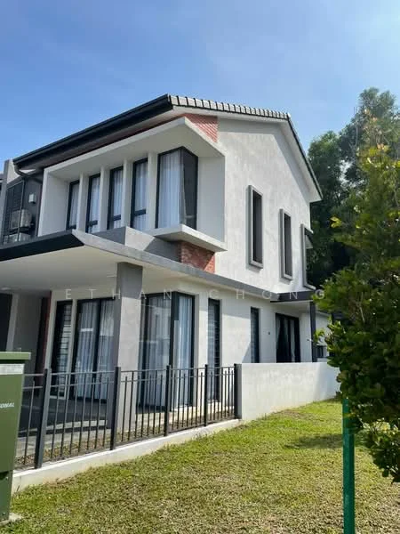 Exterior type: semi-detached house; features: white painted facade, grey accent wall, recessed balconies, sliding glass doors, large windows with sheer curtains, pitched tile roof, manicured lawn, fenced front yard, brick detailing, two-storey structure; style: modern.