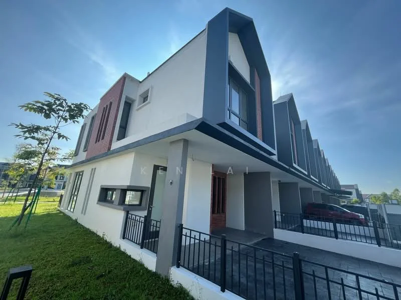 Exterior type: linked terrace house; features: white painted facade, grey accent panels, red brick feature wall, flat roof, two-storey structure, manicured lawn, paved walkway, fenced front yard, large windows, balconies on upper level; style: modern.