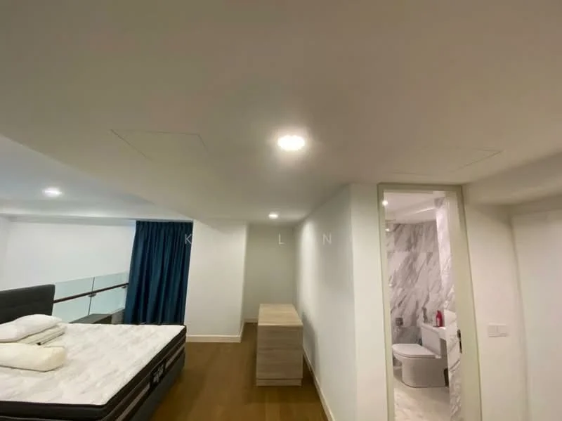 Room features: white painted walls, recessed downlights, wood flooring, grey upholstered bed, mattress on bed, blue curtains, wooden dresser, doorway leading to bathroom, marble tile flooring in bathroom, toilet visible in bathroom; style: modern.