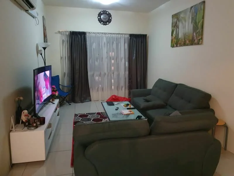 Living features: grey fabric sectional sofa, white TV console, wall-mounted TV, area rug with geometric pattern, coffee table, floor-to-ceiling windows with sheer curtains, dark grey curtains, ceiling-mounted air conditioning unit, decorative wall art, wall clock; style: modern.