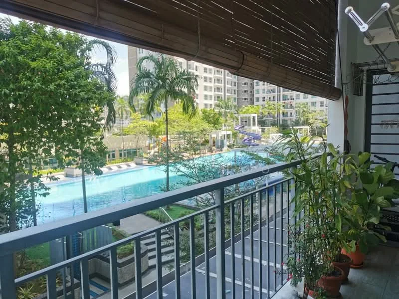 Balcony features: bamboo roller blinds, metal railing, potted plants, view of swimming pool, view of landscaped garden, view of surrounding buildings, concrete flooring; style: modern; view: pool.