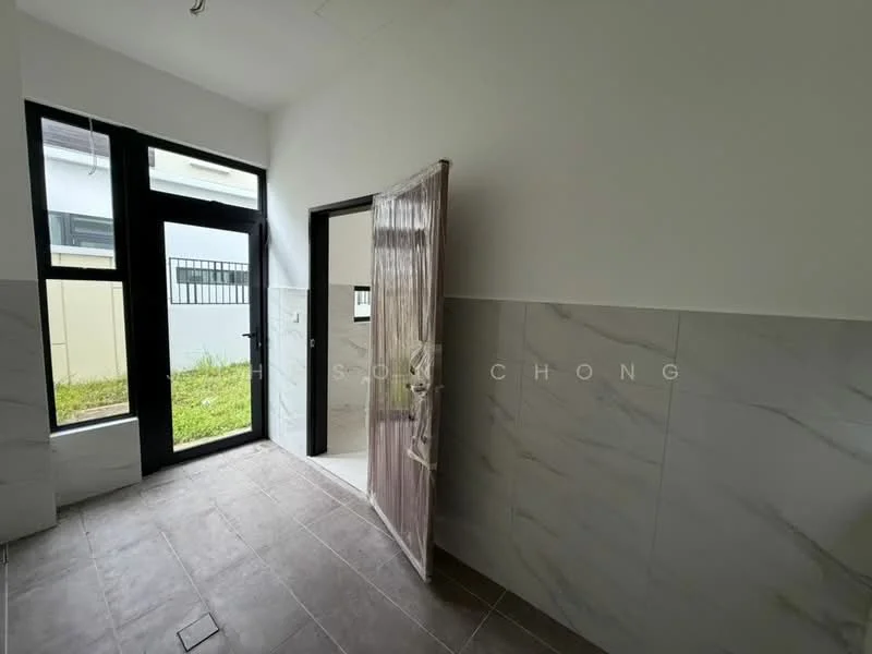 Room features: white painted walls, grey marble tile flooring, large windows, glass door, wooden door, green grass visible outside, tile cladding on lower half of walls, natural light; style: modern; view: garden.