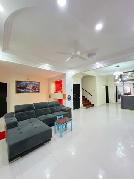 Living features: L-shape sectional sofa in grey, coffee table in blue, white painted walls, polished tile flooring, recessed downlights, 5-blade ceiling fan, decorative painting on wall, staircase visible in background, open layout to dining area, wall-mounted TV console, entrance to kitchen area visible; style: modern.