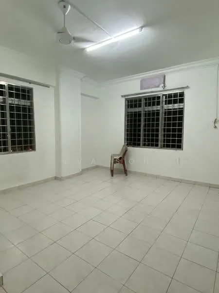 Room features: white painted walls, tile flooring, ceiling fan, two large windows with grilles, neutral color scheme, corner chair, fluorescent ceiling light; style: minimalist.