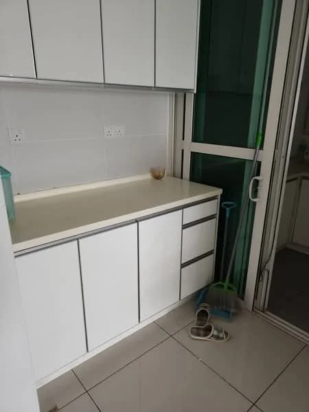 Laundry features: white cabinetry with flat-panel doors, white countertop, ceramic tile flooring, sliding glass door, wall-mounted electrical outlets, cleaning supplies visible, scooper, slippers on the floor; style: modern.