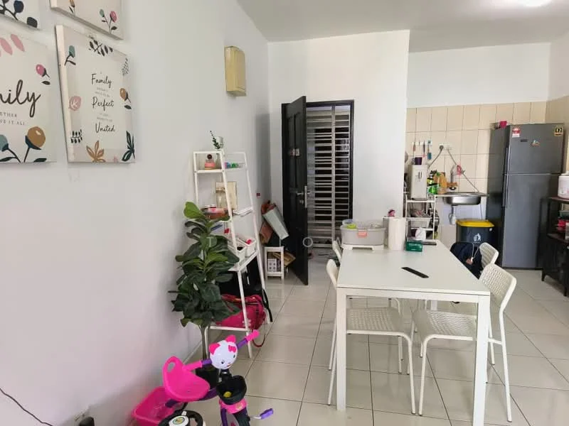 Dining features: white dining table, 4 white plastic chairs, green potted plant, framed wall art with floral design, white shelving unit, black door, grey tiled flooring, refrigerator, kitchen countertop with sink, wall-mounted cabinets, kitchen appliances visible; style: modern.