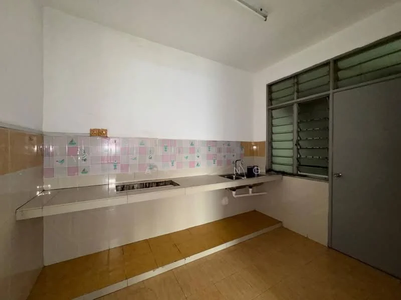 Kitchen features: L-shaped countertop, stainless-steel sink, single-bowl sink, chrome faucet, pink and white tiled backsplash, cream tiled walls, ceramic tile flooring, window with metal grilles, door to adjacent room, open shelving under countertop.