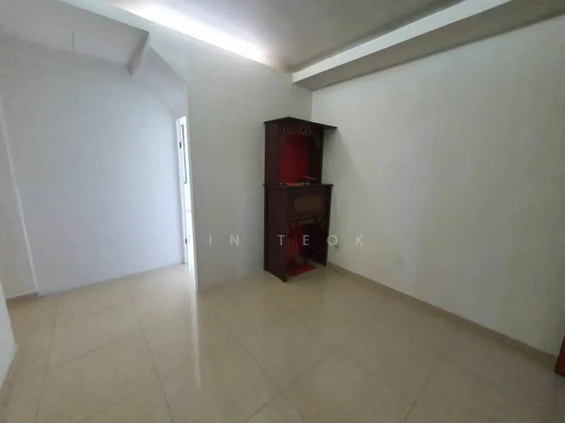 Room features: white painted walls, cream tiled flooring, built-in wooden cabinet, natural light from window, simple ceiling with no visible fixtures; style: minimalist.
