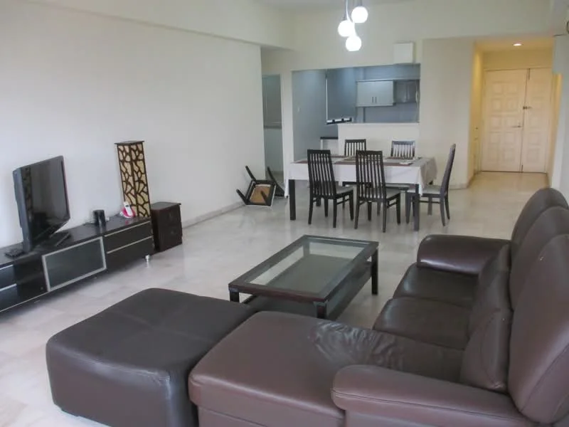 Living features: L-shape sectional sofa in brown leather, glass coffee table, TV console with flat-screen TV, marble flooring, white painted walls, pendant lighting, dining table with chairs, open layout to kitchen, decorative screen, floor-to-ceiling windows, neutral color palette; style: modern. Kitchen features: kitchen cabinets in grey, stainless-steel sink, built-in appliances, open layout to living area; style: modern.