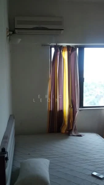 Bedroom features: wall-mounted split AC, window with sheer curtains, striped curtains in yellow and brown, queen-size bed, upholstered headboard, decorative pillow, light grey walls, wooden bed frame.