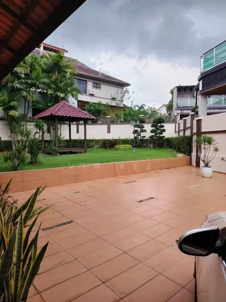 Exterior type: detached bungalow; features: manicured lawn, tropical landscaping, paved driveway, gazebo with tiled roof, surrounding greenery, two-storey house, covered car porch; style: modern.