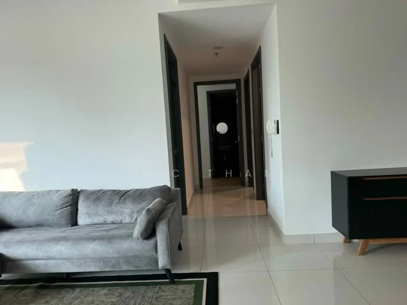 Living features: grey fabric sofa, area rug with geometric pattern, white painted walls, glossy tile flooring, recessed downlights, black console table, doorway leading to hallway, large windows with natural light; style: modern. Room features: white painted walls, glossy tile flooring, doorway leading to other rooms.